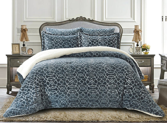 A floral quilted winter bedding set in blue and white, displayed on a bed with ornate bedding accessories.