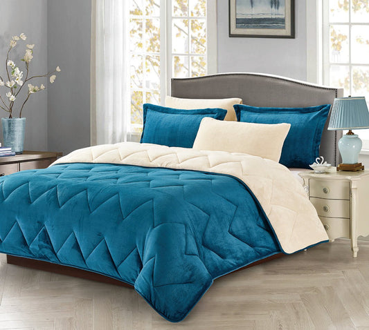 A king-sized bedding set with a quilted design, featuring a dual-tone geometric pattern with blue and beige colors, including a comforter, two pillow shams, and a bed sheet set in a bedroom setting.