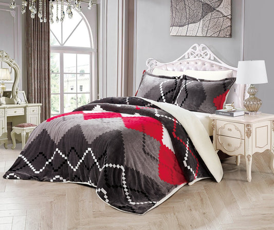 A king-size bedding set with a colorblock print in red, gray, and black, displayed on a bed with a decorative headboard, alongside a nightstand and a lamp.