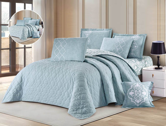 Sky blue diamond quilted comforter set on a bed, with a pillows and a comforter folded at the foot of the bed. A small inset image shows a close-up of the pattern detail.