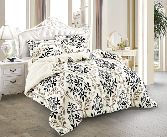 A king-sized bedding set with black floral embroidery on a white background, displayed in a bedroom setting. The set includes a comforter, two pillow shams, and a bedsheet.