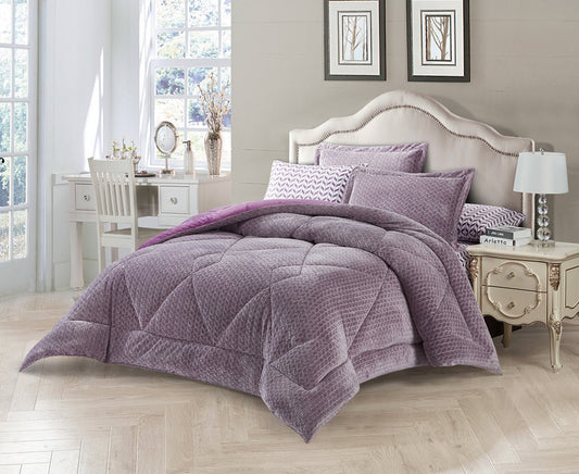 A king-size purple quilted bedding set is displayed on a bed, with additional pillows and a velvet pillow sham. The bedding set appears plush and is placed in a room with a classic decor.