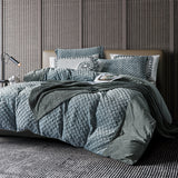 Blaues Bettdeckenset mit Blumenstickerei und eleganter Textur