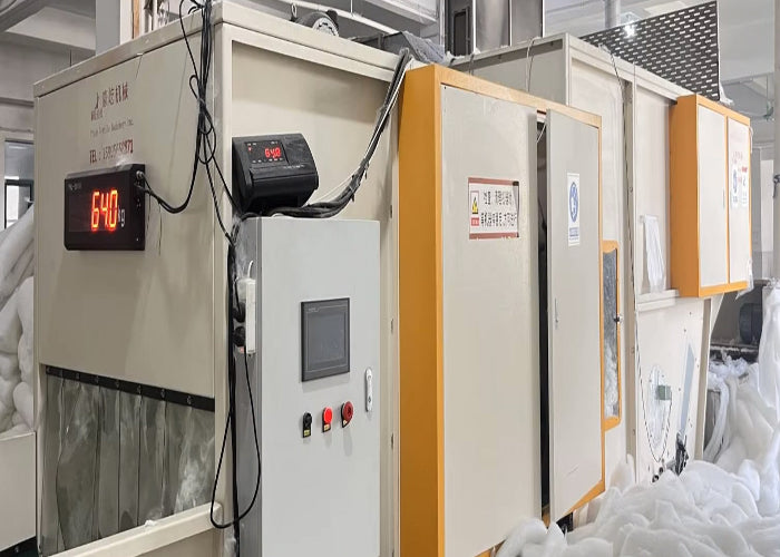 Industrial equipment with digital display and controls in a factory setting