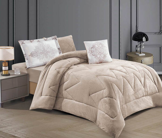 A brown striped floral wavy-quilted comforter set on a bed, with two decorative pillowcases, placed in a room with a gray wall and wooden flooring.