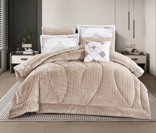 A brown striped quilted comforter set on a king-sized bed, with two decorative pillowcases displayed in a modern bedroom setting.