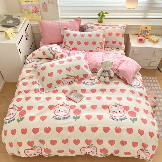 A cotton duvet cover set with a pattern featuring Care Bears characters, predominantly in pink and white colors, with hearts and floral motifs.