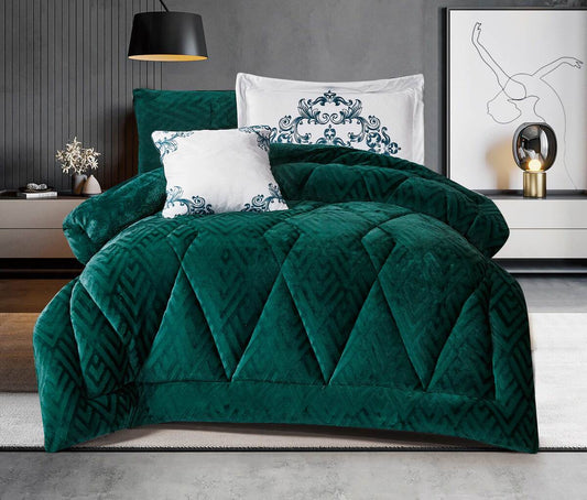A green diamond print comforter set on a bed, with matching pillowcases displayed in a bedroom setting.
