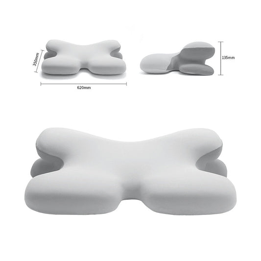 A horn-shaped ergonomic memory foam pillow in gray, displayed from multiple angles with dimensions shown.