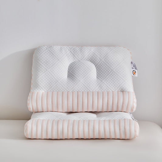 A beige and white traction pillow with a striped pattern, designed for back support.