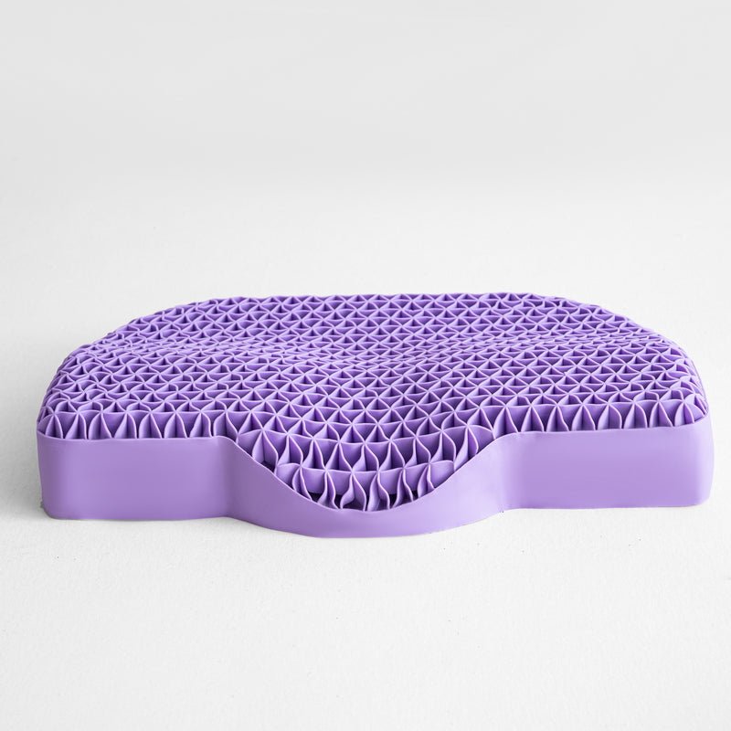 A purple TPE dynamic pressure relief pillow designed with a geometric pattern