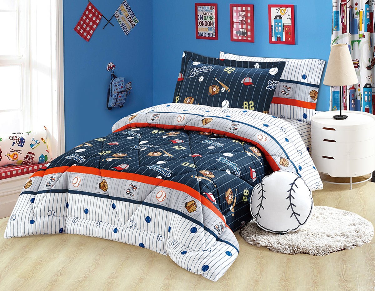 A quilted bedding set with a sports ball theme, displayed in a bedroom setting. The set includes a comforter, pillows, and bed sheets with a design that features various sports balls and a striped pattern.