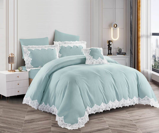 A blue lace-trimmed comforter set on a bed, with matching pillows and bedsheet, in a bedroom setting.