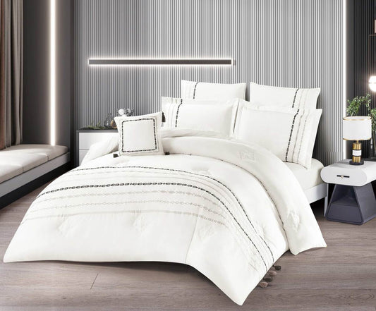 A white bedding set with minimalist stripe design, displayed on a bed in a modern bedroom setting.
