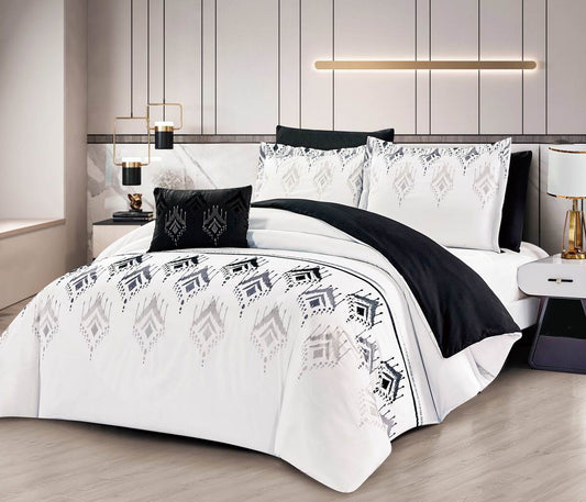 A bedding set with a geometric pattern, featuring a combination of white, black, and gray colors, displayed in a bedroom setting.