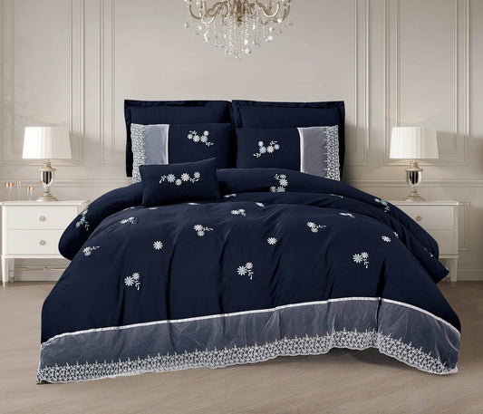 A blue bedding set with daisy lace detailing, displayed on a bed with a white background. The set includes a comforter, pillows, and a bedsheet.