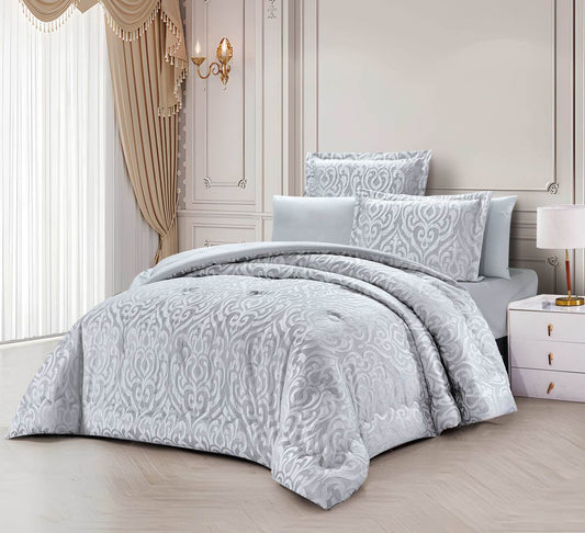 A bedding set with a floral pattern, featuring a comforter, sheets, and pillows, displayed in a bedroom setting.