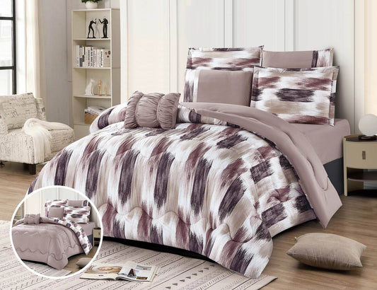 A distressed print summer comforter set in beige, brown, and white colors, displayed on a bed with matching pillows and bed sheet.