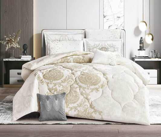 A luxury cream-colored comforter set with floral embroidery displayed on a bed, accompanied by matching pillows and a comforter, presented in a stylish bedroom setting.