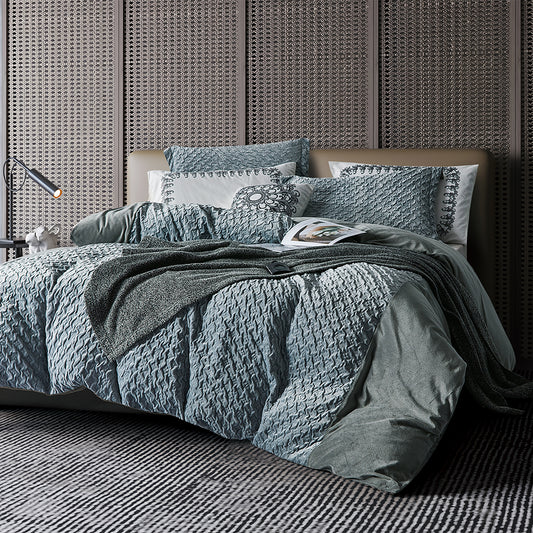 Blaues Bettdeckenset mit Blumenstickerei und eleganter Textur