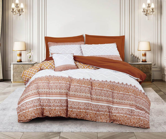 A bedding set with a geometric patchwork design in red and white colors, displayed on a bed with a wooden headboard in a room with ornate wall moldings and decorative lighting.