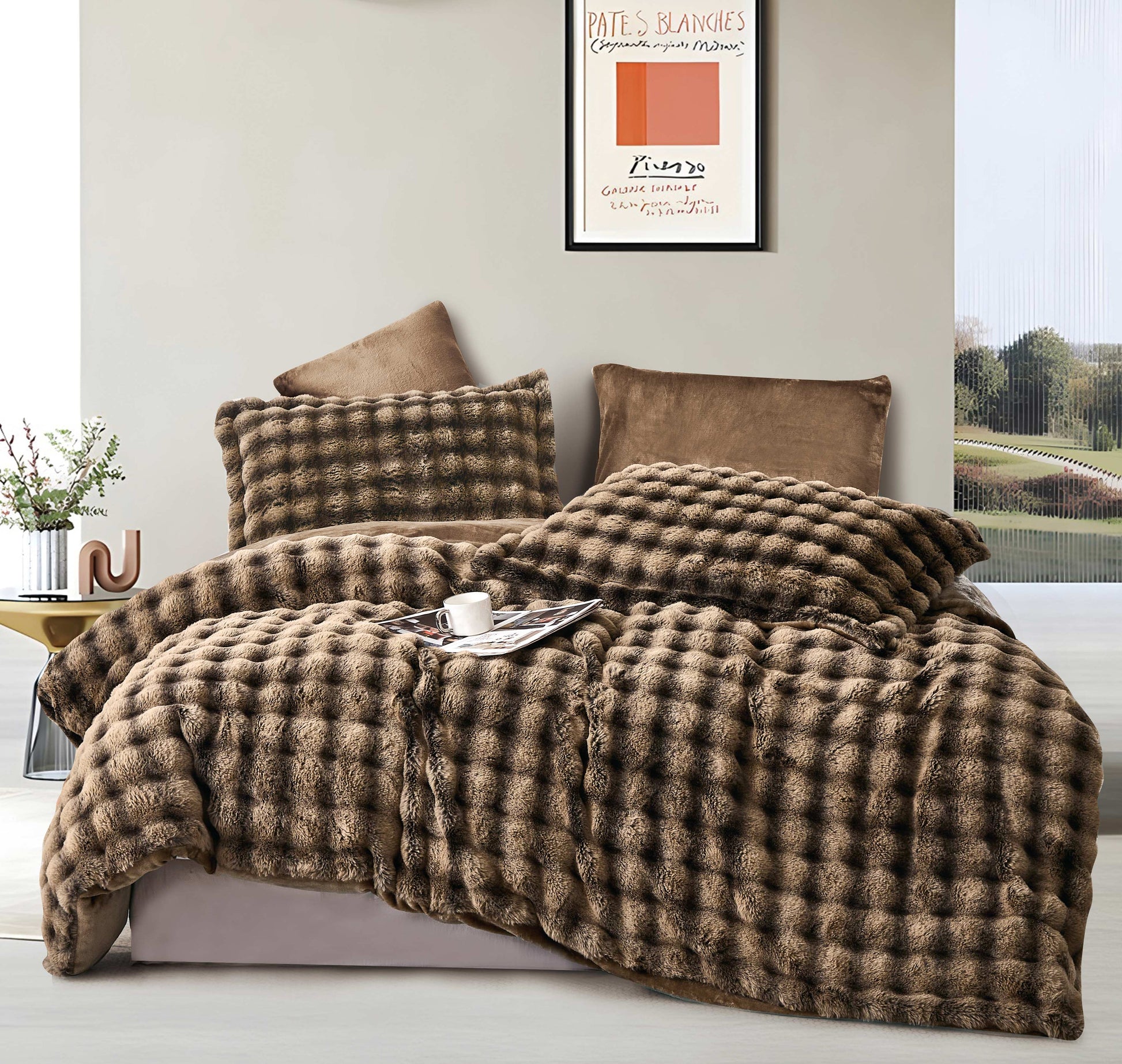 A brown quilted comforter set on a bed, with accompanying pillow shams, displayed in a bedroom setting.