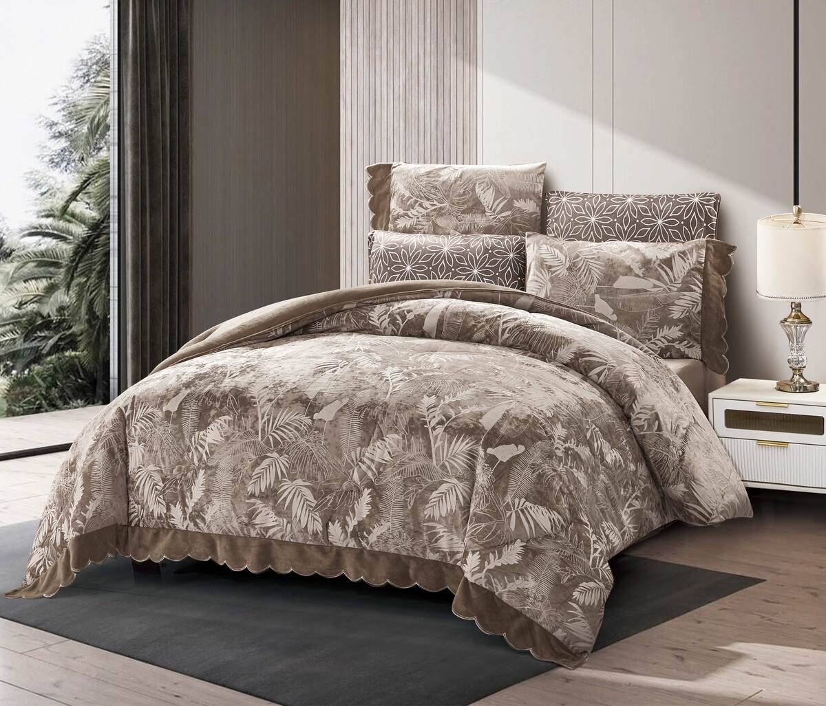 A floral lace-trimmed flannel comforter set in beige and brown colors, displayed on a bed with matching pillows and bed skirt.
