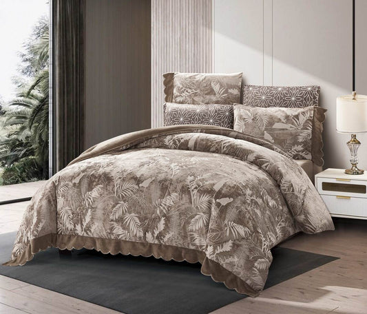 A floral lace-trimmed flannel comforter set in beige and brown colors, displayed on a bed with matching pillows and bed skirt.