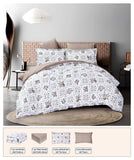 Floral patterned comforter set on a bed with matching pillows and bedding pieces displayed below.