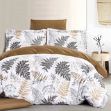 Bedding set with leaf pattern on a bed in a bedroom setting