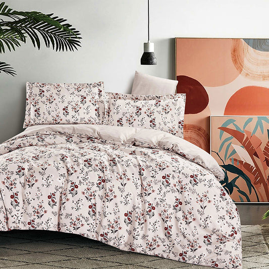 Floral bedding set on a bed with abstract art in the background