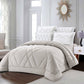 Neatly made bed with white bedding in a bright bedroom